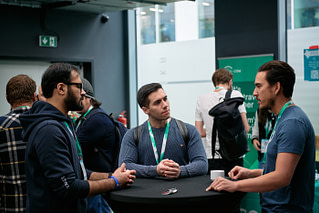 Attendees chatting at DevRelCon Prague